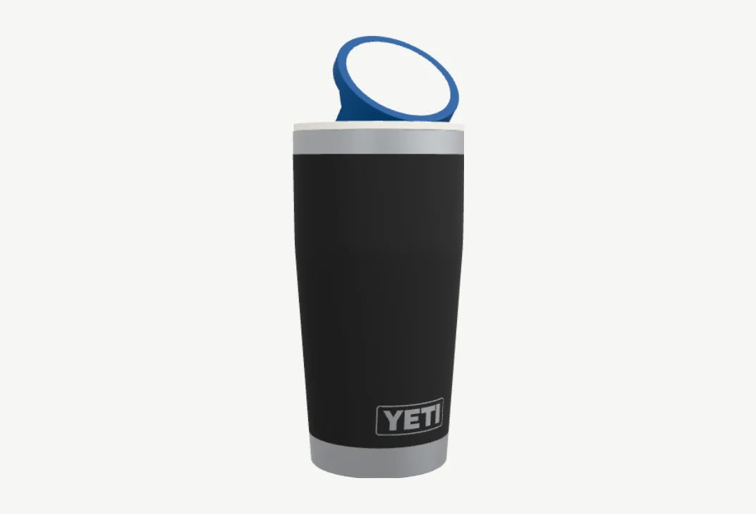 Black YETI tumbler wearing an NMT mount with a white base and blue ring