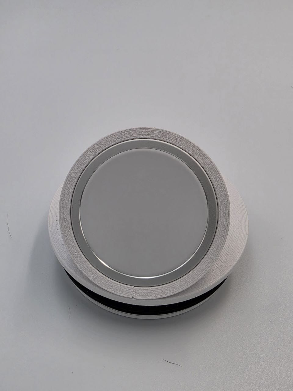 White NMT MagSafe mount fitted to a Stanley Everyday Tumbler