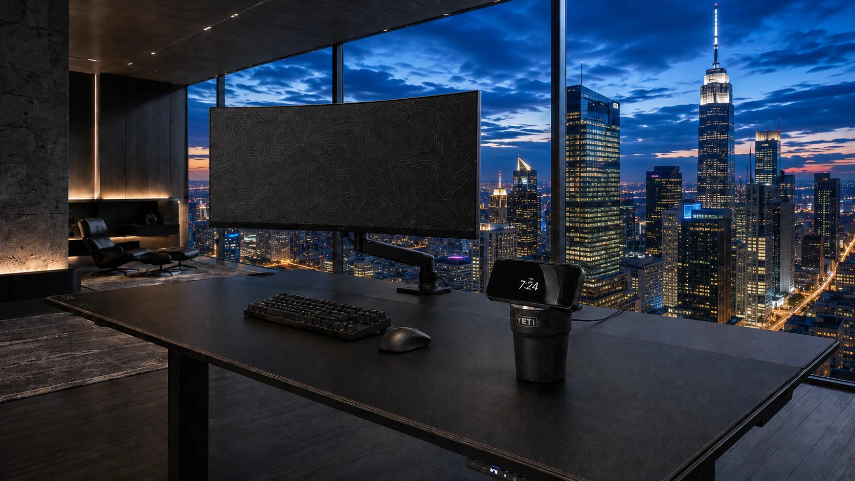 An NMT phone dock on a black desk overlooking the city at dusk